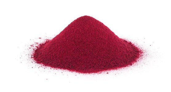 Small pile of bright red tart cherry powder